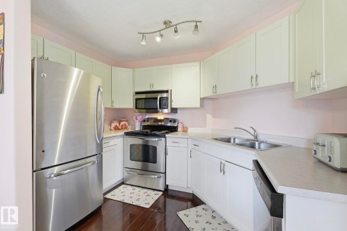 204 10827 85 Avenue, Edmonton, AB - Indoor Photo Showing Kitchen With Double Sink