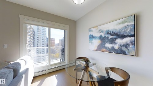 Sliding glass door opening to an exterior balcony - #1603 10410 102 Av Nw, Edmonton, AB - Indoor