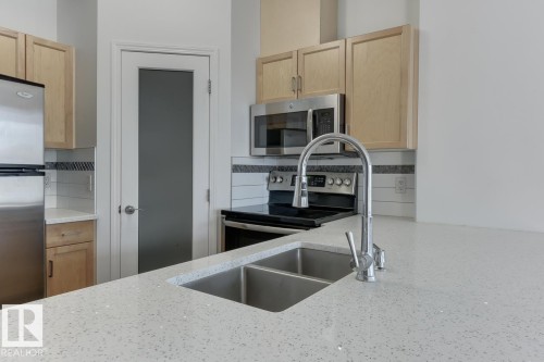 1201 10504 99 Avenue, Edmonton, AB - Indoor Photo Showing Kitchen With Double Sink With Upgraded Kitchen
