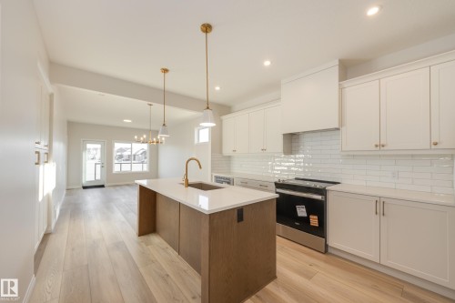 196 Stonehouse Way, Leduc, AB - Indoor Photo Showing Kitchen With Upgraded Kitchen