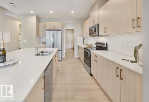 8727 224 Street, Edmonton, AB - Indoor Photo Showing Kitchen With Stainless Steel Kitchen With Double Sink With Upgraded Kitchen