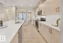 8727 224 Street, Edmonton, AB  - Indoor Photo Showing Kitchen With Stainless Steel Kitchen With Double Sink With Upgraded Kitchen 
