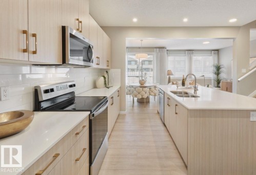 8727 224 Street, Edmonton, AB - Indoor Photo Showing Kitchen With Stainless Steel Kitchen With Double Sink With Upgraded Kitchen