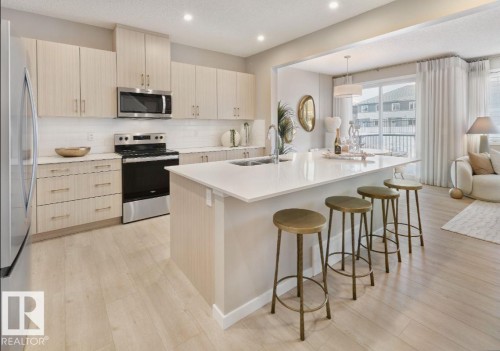 8727 224 Street, Edmonton, AB - Indoor Photo Showing Kitchen With Stainless Steel Kitchen With Double Sink With Upgraded Kitchen