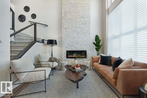 8739 224 Street, Edmonton, AB - Indoor Photo Showing Living Room With Fireplace