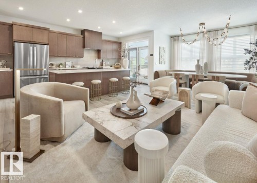Living room featuring recessed lighting and a textured ceiling - 2131 194 Street, Edmonton, AB - Indoor Photo Showing Dining Room