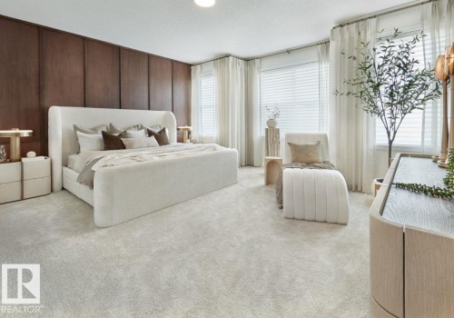 Bedroom with carpet flooring and a textured ceiling - 2131 194 Street, Edmonton, AB - Indoor Photo Showing Bedroom