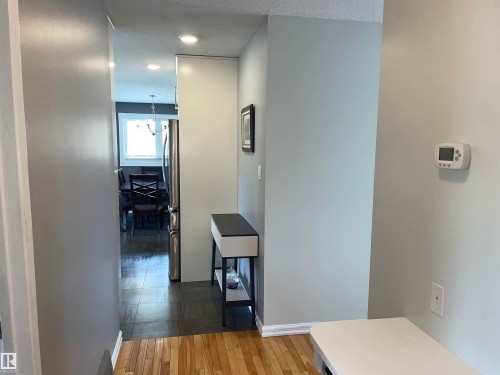 This area features recessed lighting and light-toned walls, creating a bright and inviting atmosphere - 14212 30 Street, Edmonton, AB - Indoor Photo Showing Other Room