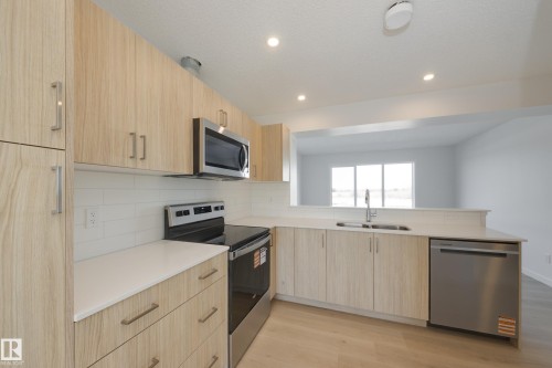 17232 4 Street, Edmonton, AB - Indoor Photo Showing Kitchen With Stainless Steel Kitchen With Double Sink