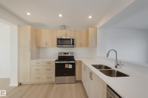 17232 4 Street, Edmonton, AB - Indoor Photo Showing Kitchen With Stainless Steel Kitchen With Double Sink