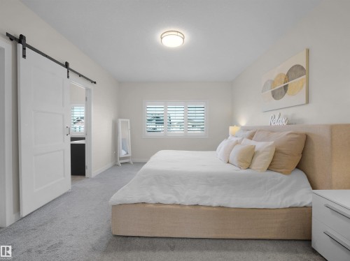 821 Morris Avenue, Leduc, AB - Indoor Photo Showing Bedroom