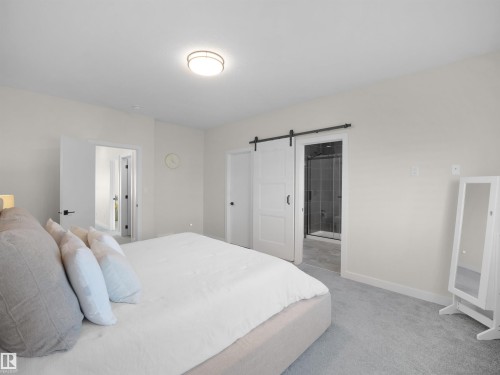 821 Morris Avenue, Leduc, AB - Indoor Photo Showing Bedroom