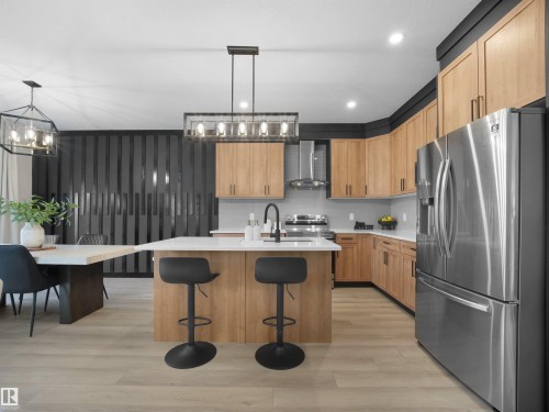 821 Morris Avenue, Leduc, AB - Indoor Photo Showing Kitchen With Double Sink