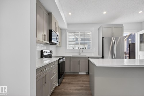 3605 James Mowatt Trail, Edmonton, AB - Indoor Photo Showing Kitchen With Upgraded Kitchen
