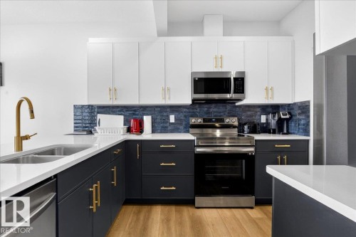 15 1910 Collip View View Sw, Edmonton, AB - Indoor Photo Showing Kitchen With Double Sink