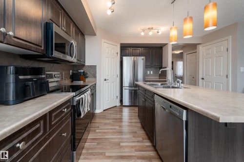 92 Calvert Wynd, Fort Saskatchewan, AB - Indoor Photo Showing Kitchen With Double Sink