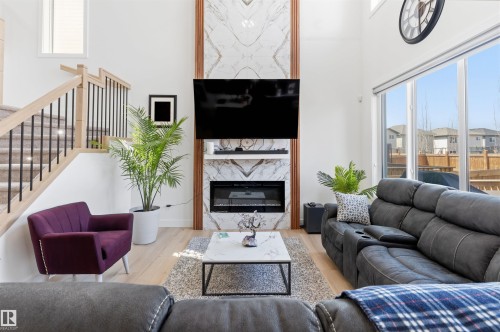 439 Roberts Cres, Leduc, AB - Indoor Photo Showing Living Room With Fireplace