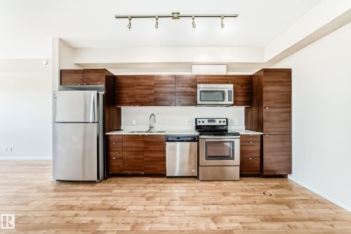 413 9519 160 Avenue, Edmonton, AB - Indoor Photo Showing Kitchen With Stainless Steel Kitchen