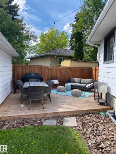 Expansive wood deck with a full privacy fence - 8239 93A Avenue, Edmonton, AB - Outdoor With Deck Patio Veranda With Exterior