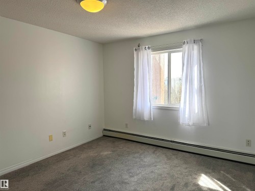 210 11325 83 Street, Edmonton, AB - Indoor Photo Showing Other Room