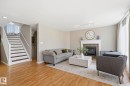 3327 32 Avenue, Edmonton, AB  - Indoor Photo Showing Living Room With Fireplace 
