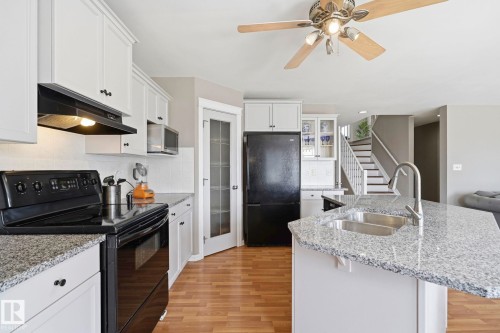 3327 32 Avenue, Edmonton, AB - Indoor Photo Showing Kitchen With Double Sink