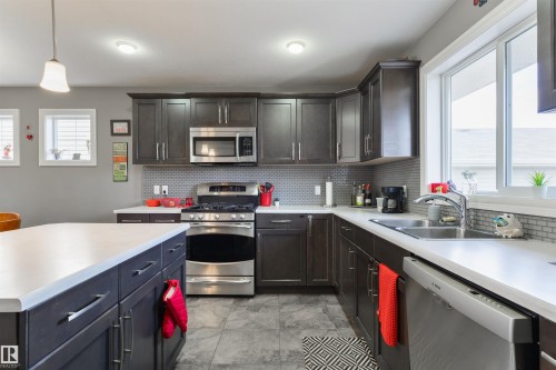 102 Kirpatrick Bend, Leduc, AB - Indoor Photo Showing Kitchen With Double Sink