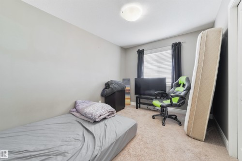 102 Kirpatrick Bend, Leduc, AB - Indoor Photo Showing Bedroom
