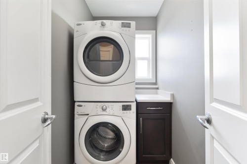 102 Kirpatrick Bend, Leduc, AB - Indoor Photo Showing Laundry Room