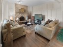12335 25 Avenue, Edmonton, AB  - Indoor Photo Showing Living Room With Fireplace 