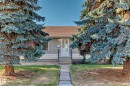 Front exterior featuring a light-colored stucco facade with white trim - 13124 83 Street, Edmonton, AB  - Outdoor 