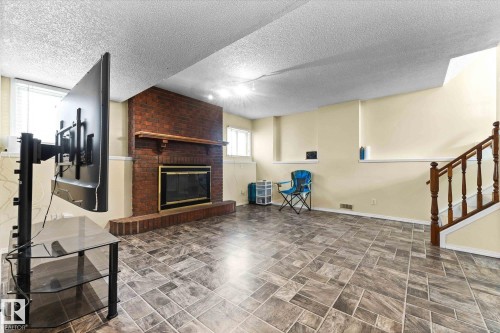 124 Klarvatten Road, Edmonton, AB - Indoor With Fireplace