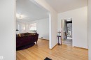 Hardwood flooring throughout the entry and living area - 9602 85 Street, Edmonton, AB  - Indoor 