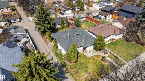 Ranch-style residence featuring a dark shingle roof and light-toned siding - 9602 85 Street, Edmonton, AB - Outdoor With View