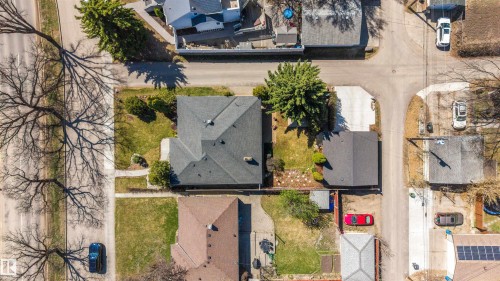Residential property with a dark shingle roof, situated on a corner lot - 9602 85 Street, Edmonton, AB - Outdoor With View