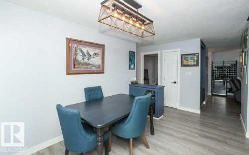 Contemporary overhead chandelier - 27132A Twp Rd 632, Rural Westlock County, AB - Indoor Photo Showing Dining Room