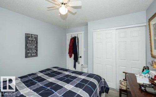 Light blue walls with white trim throughout - 27132A Twp Rd 632, Rural Westlock County, AB - Indoor Photo Showing Bedroom