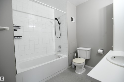 The main bathroom on the top floor serves both the 2nd and 3rd bedrooms via the hallway door, but also doubles as a private ensuite for the master bedroom, via it's own private door.  Another nice touch - 6706 36A Avenue, Edmonton, AB - Indoor Photo Showing Bathroom