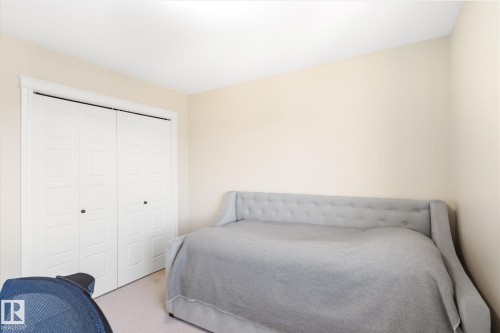 Interior room featuring neutral wall color and light-colored carpeting - 6864 Evans Wynd, Edmonton, AB - Indoor Photo Showing Bedroom