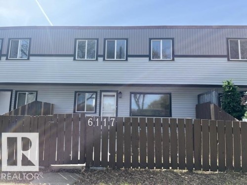 Two-story townhome featuring light blue and dark gray siding - 6117 120 Avenue, Edmonton, AB - Outdoor