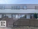 Two-story townhome featuring light blue and dark gray siding - 6117 120 Avenue, Edmonton, AB  - Outdoor 