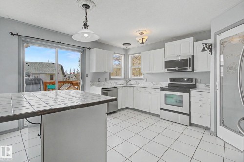 1 Deer Park Road, Spruce Grove, AB - Indoor Photo Showing Kitchen With Double Sink