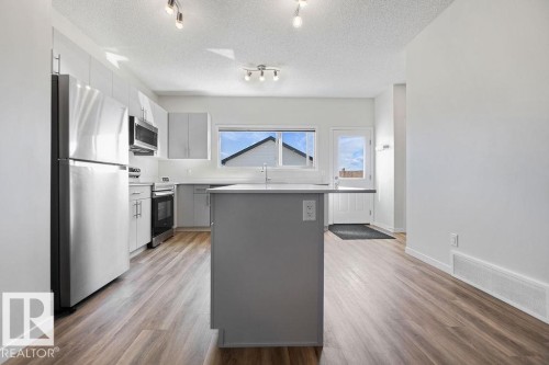7123 46A Street, Beaumont, AB - Indoor Photo Showing Kitchen With Upgraded Kitchen