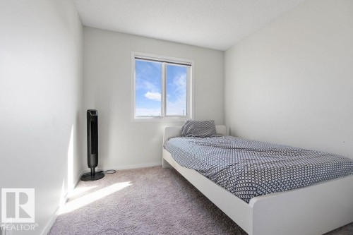 7123 46A Street, Beaumont, AB - Indoor Photo Showing Bedroom