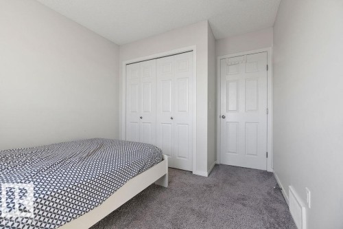 7123 46A Street, Beaumont, AB - Indoor Photo Showing Bedroom