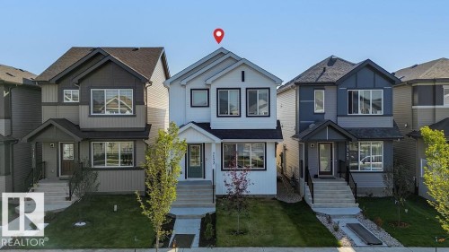 7123 46A Street, Beaumont, AB - Outdoor With Facade