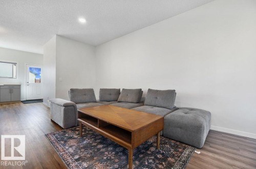 7123 46A Street, Beaumont, AB - Indoor Photo Showing Living Room