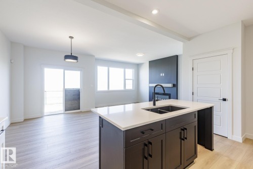 286 Lodge Pole Place, Leduc, AB - Indoor Photo Showing Kitchen With Double Sink