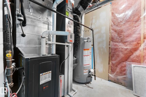Trane HVAC system and water heater installation - 362 Blackburn Drive E, Edmonton, AB - Indoor Photo Showing Basement