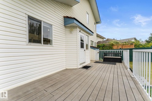 Expansive outdoor deck featuring composite decking, white railings, and direct access to the home - 362 Blackburn Drive E, Edmonton, AB - Outdoor With Deck Patio Veranda With Exterior